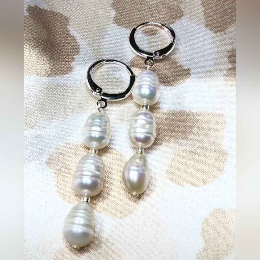 Silver plated Huggies earrings with potato pearls.